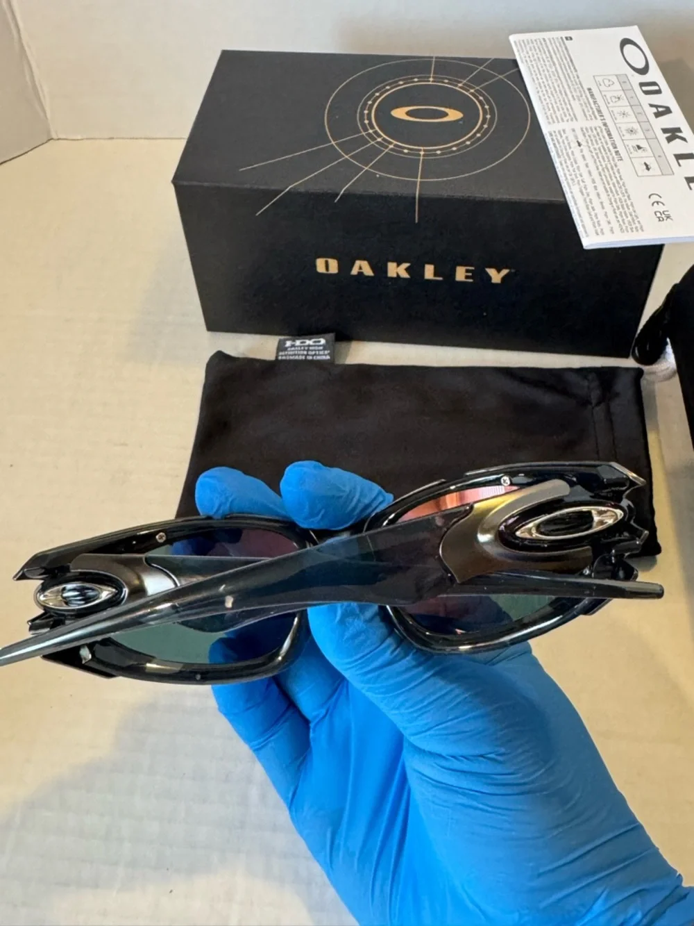 Oakley Black Sunglasses with Orange Mirror Lenses